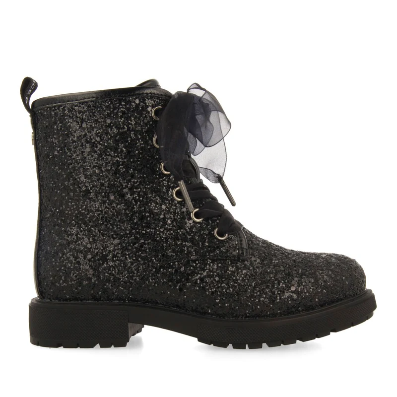 SEQUINED BOOTS AND TULLE SURANY