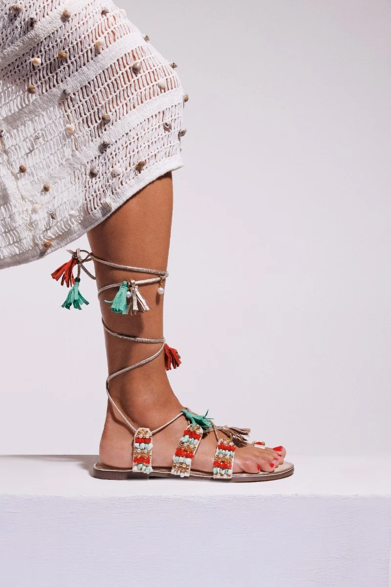 LEATHER SANDALS WITH FRINGES AND BEADS NUBO