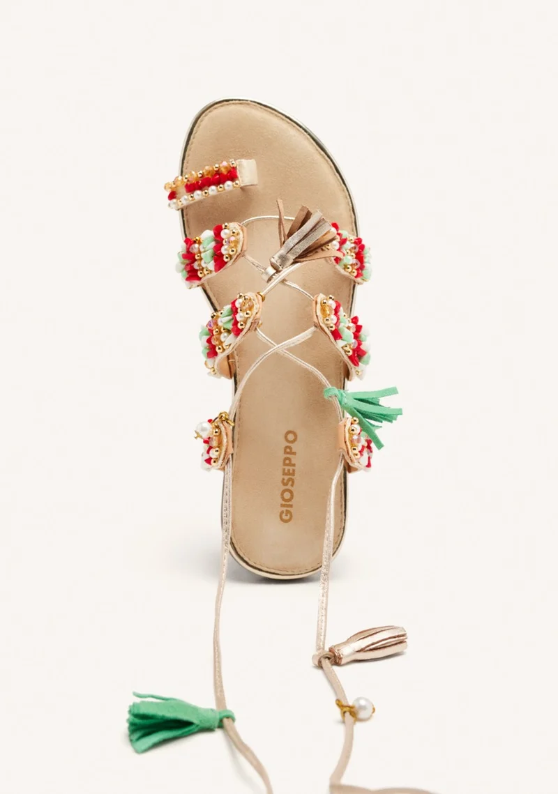 LEATHER SANDALS WITH FRINGES AND BEADS NUBO