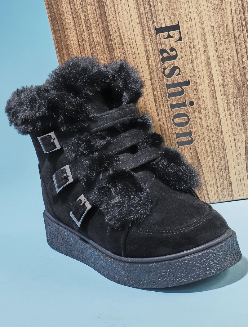 Boots à fourrure synthétique et sanglées - noir