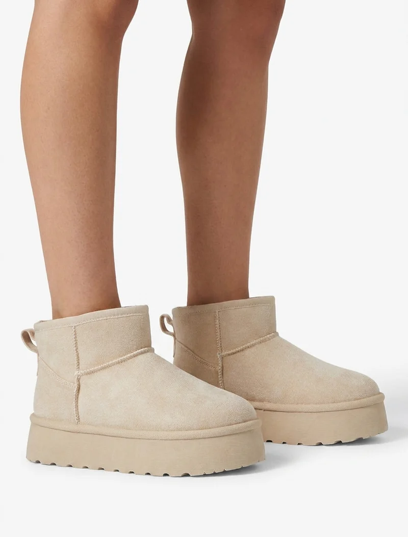 Bottines fourrées en suédine - Beige