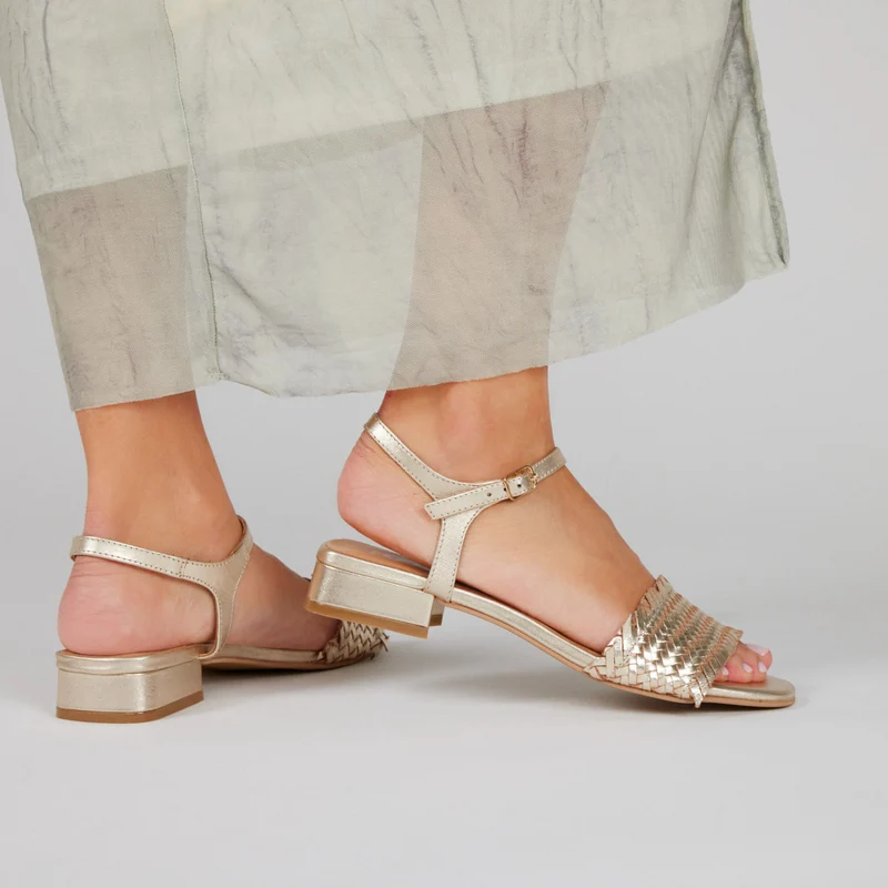 Kourou women's gold braided sandals with low heels