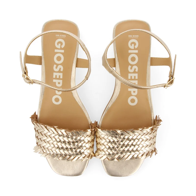 Kourou women's gold braided sandals with low heels