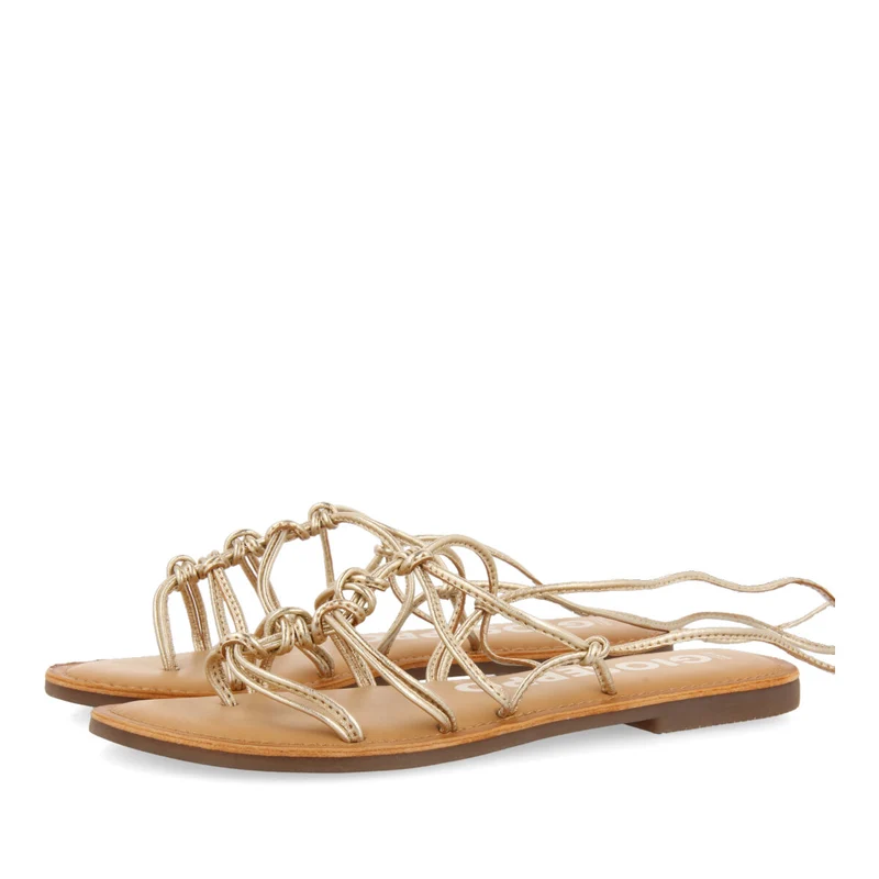 Kern women's flat gold leather sandals with thin straps and decorative knots