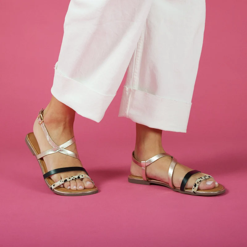 Megara women's sandals with gold straps and cow print