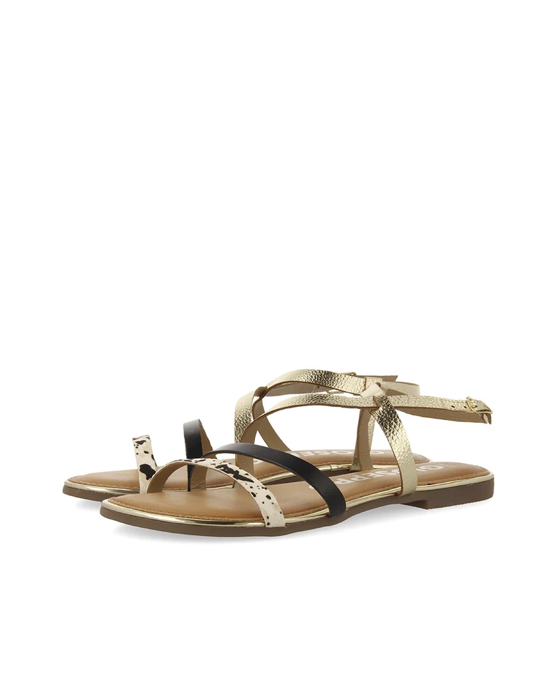 Megara women's sandals with gold straps and cow print