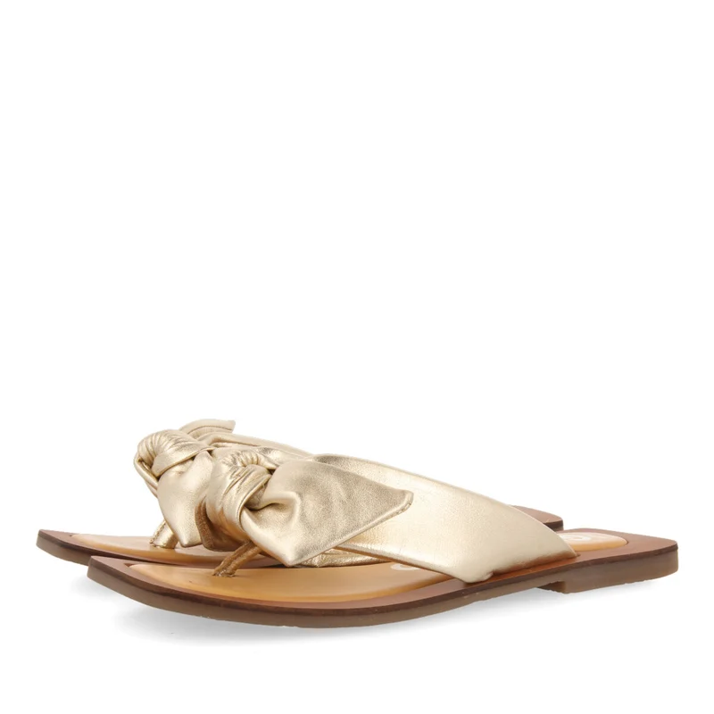 Acucena women's gold leather sandals with decorative knots