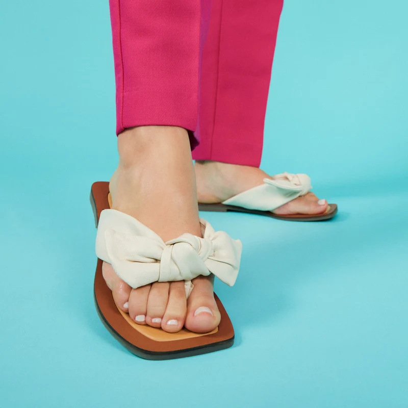 Acucena women's off-white leather sandals with decorative knots