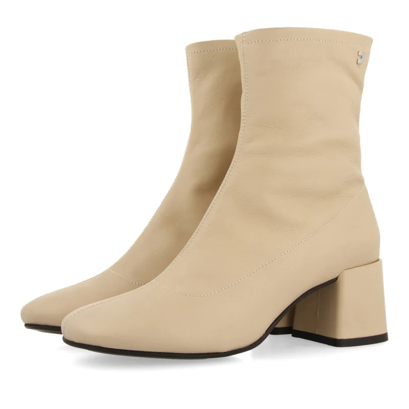 Artas women's cream leather ankle boots with mid heels and round toes